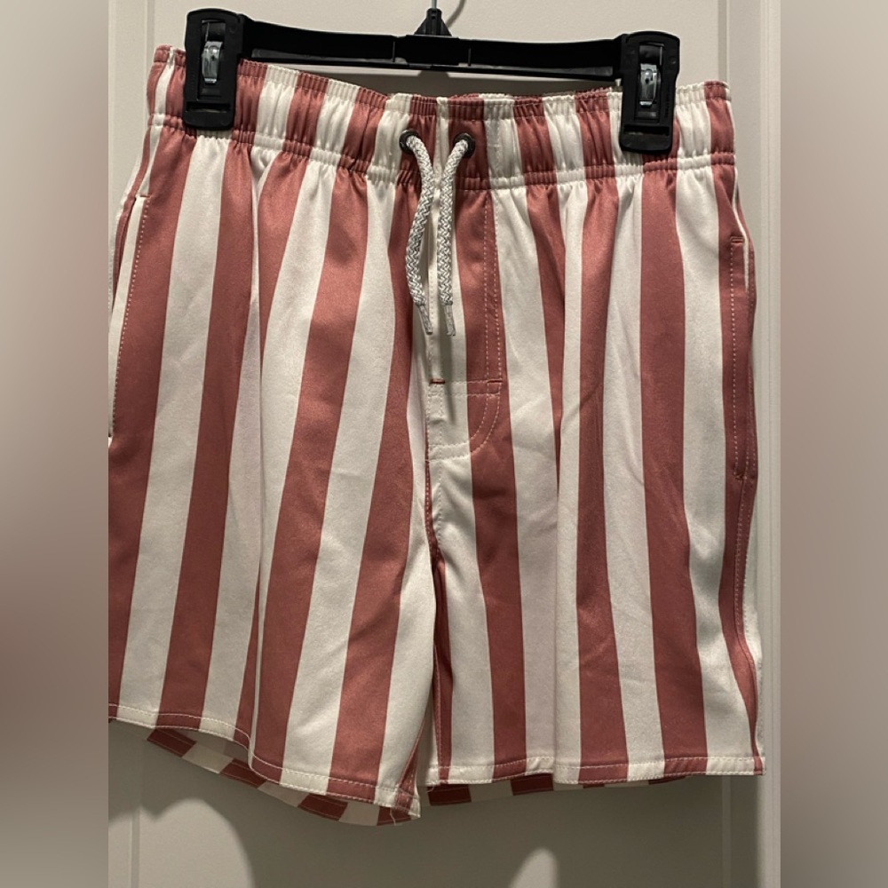 NWT Boys swim trunks with pockets Class/Club size 10/12 these are haute!